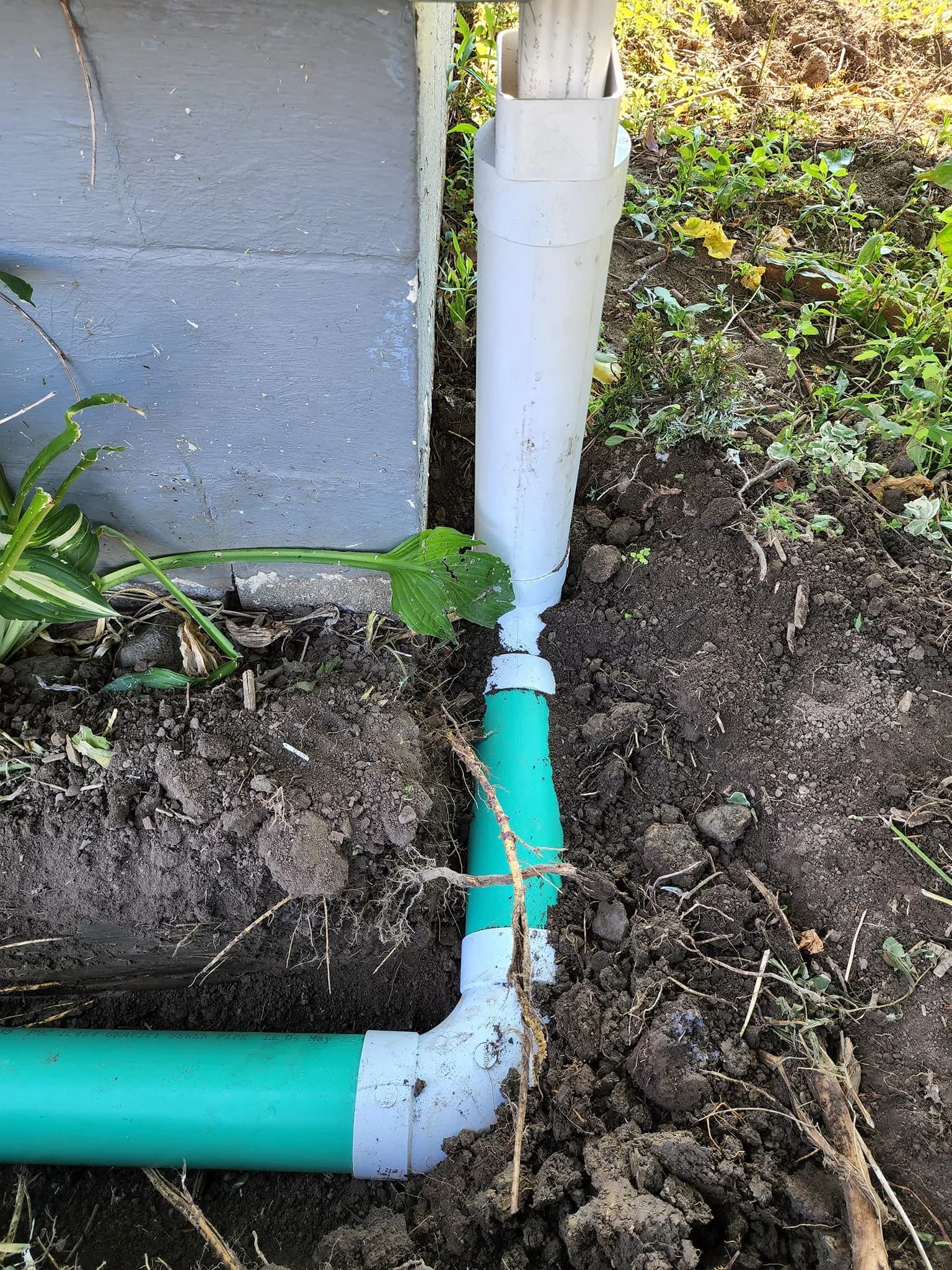 Millie Excavating crew completing a sewer line repair