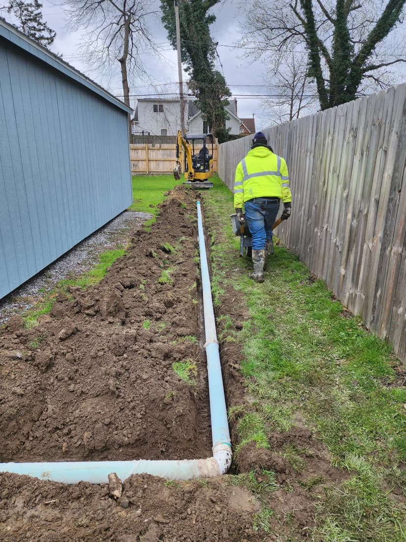 Crew installing sewer line